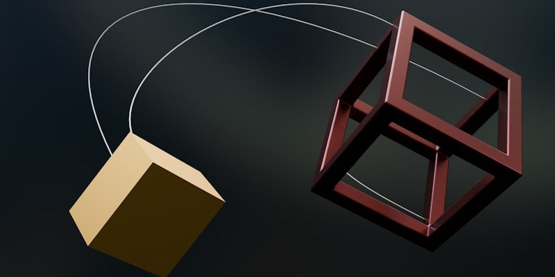 A picture of a cube and a box hanging from a string